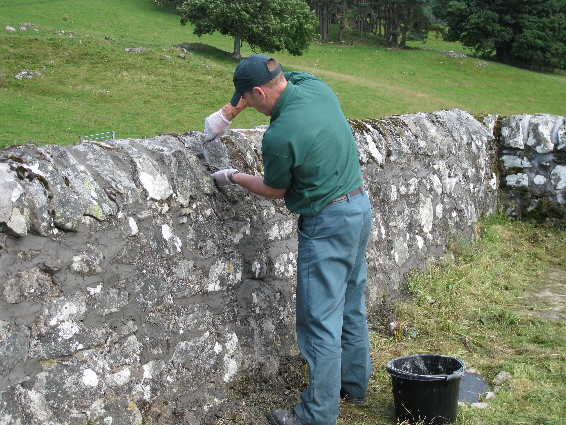 Re-pointing the walls at Borenich burial ground (July 2009)